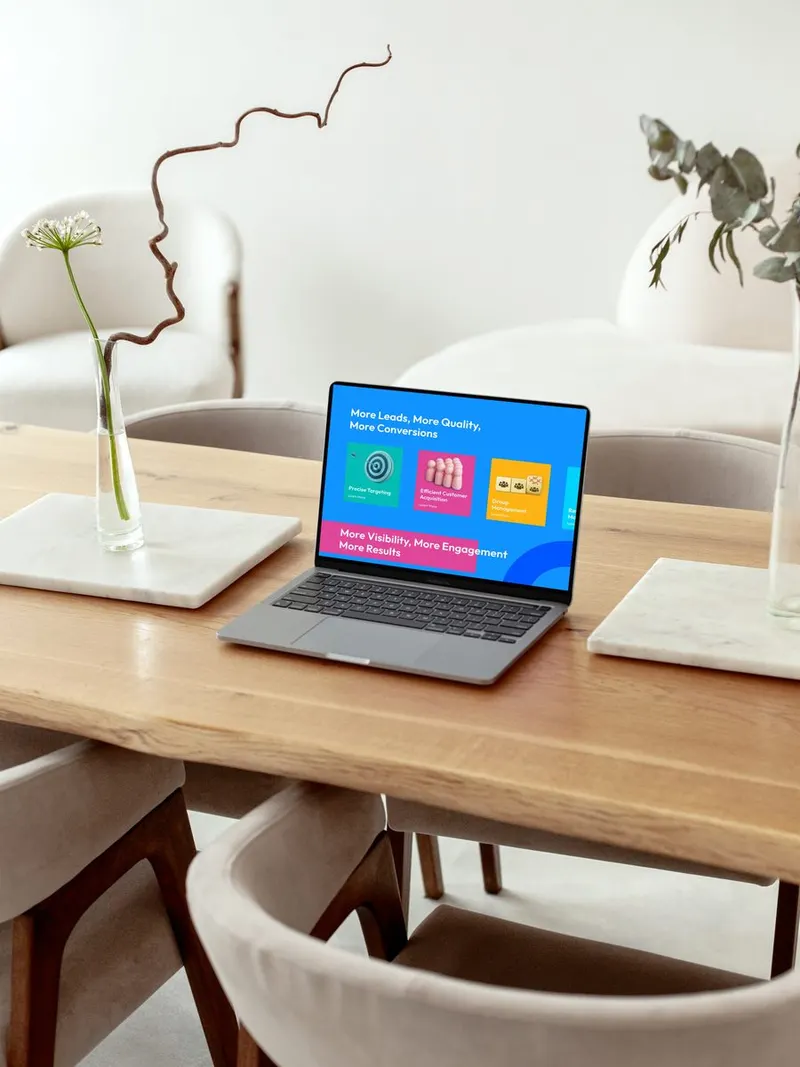 Promo Picasso website section on leads and conversions, with colourful feature cards on a laptop