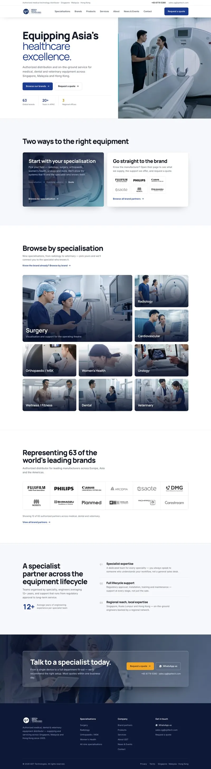 The full QST homepage, from the hero to specialisations, brands, services and the footer