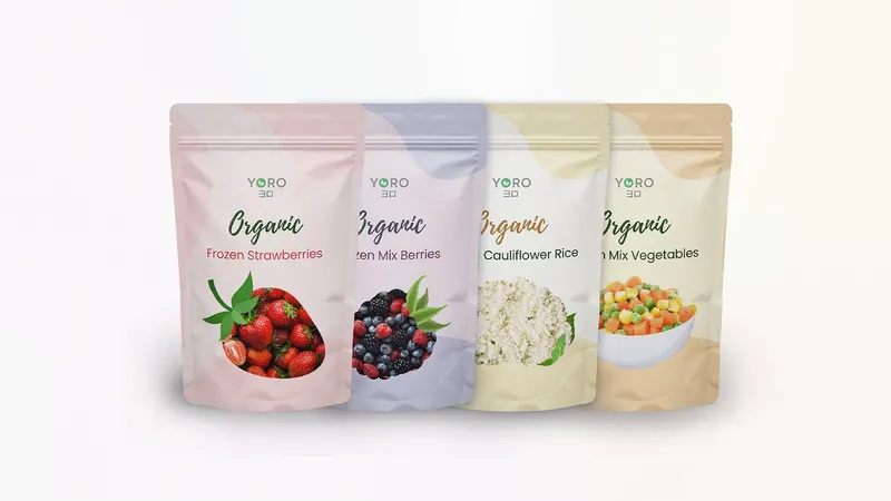 YORO frozen food packaging in four pastel pouches, from strawberries to mixed vegetables